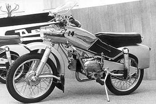 Derny Taon T4 classic motorcycle pictured on display at the Paris motorcycle show in 1956