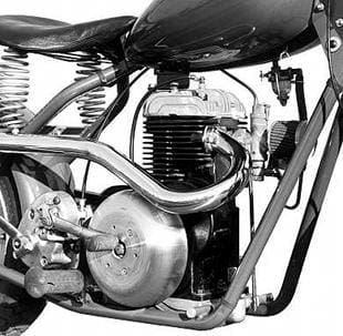 Mustang motorcycle engine redesign saw both exhauist and carburettor situated at front of the engine