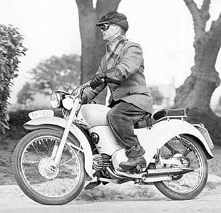 Vic Willoughby tests a Moto Guzzi lightwight motorcycle in 1954