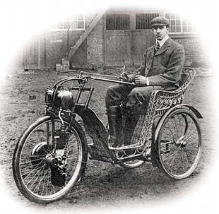 OEC company founder Frederick Osborn poses on one of his self built invalid carriages in 1901
