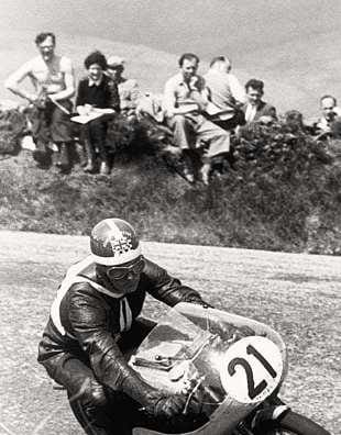 The 1958 Isle of Man 125cc TT, and Miek Hailwood hustles his way to seventh place on the Paton
