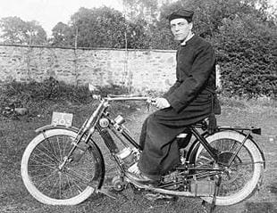 Reverand John Hodgkin poses on his Scott 1910 motorcycle