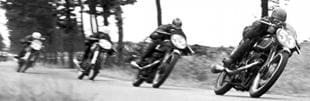 Freddie Frith leads Bob Foster, both on Velocettes, in 1949 Dutch motorcycle TT