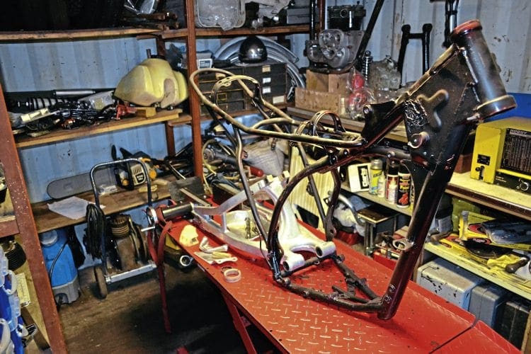 With a nice coat of aerosol black applied to the frame we can start hanging bits on it.