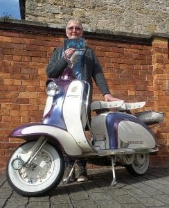 Sheila is reunited with a Lambretta after many years (thanks to John Carter for the loan of the scooter)