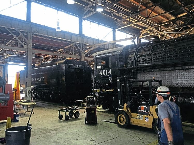 No. 4014 in the Union Pacific steam shop in Cheyenne, Wyoming, in August, after the locomotive and tender had been separated. UP 