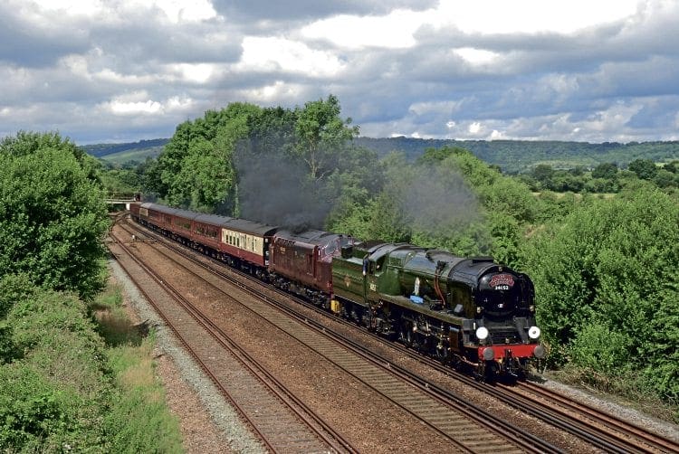 Supported by West Coast diesels front and rear for operational reasons, SR Pacific No. 34052 Lord Dowding is seen near Sevenoaks with Steam Dreams’ ‘Cathedrals Express’ from Victoria to Deal on July 24.PETER HOLLANDS