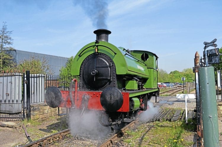 Birkenhead passes over ‘distillery crossing’ immediately before arriving at the station at Elsecar, on footplate experience duties. Inset: Birkenhead’s maker’s plate.