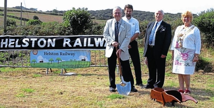 The cutting of the sod: left to right are Sir Peter Hendy, James Packman (chairman of the Helston Railway’s operating company), Chris Heaps and mayor Gillian Geer. HRPS 