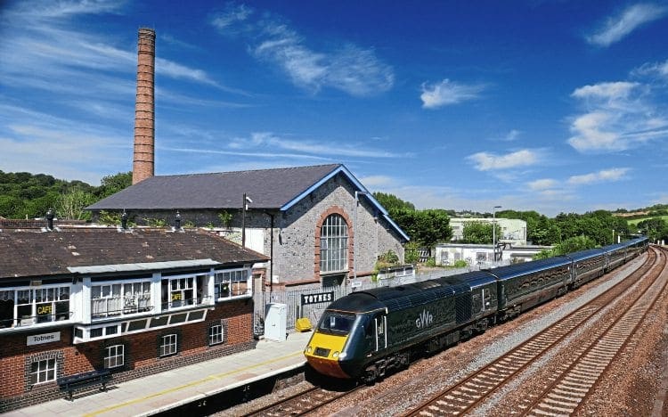 A Great Western Railway InterCity125 bound for Paddington pulls away from Totnes on August 23, with the listed Brunel atmospheric railway pumping station on the left. ROBIN JONES 