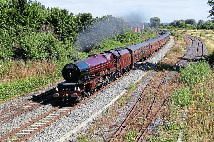 LMS Princess Royal Pacific No. 6201 Princess Elizabeth passes Aldermaston with Steam Dreams’ ‘Cathedrals Express’ from Victoria to Minehead on August 23. KEN LIVERMORE 