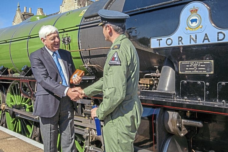 The A1 Steam Locomotive Trust’s president David Champion with RAF Marham station commander, Group Captain Rich Davies, at the affiliation ceremony at Wansford. A1SLT 