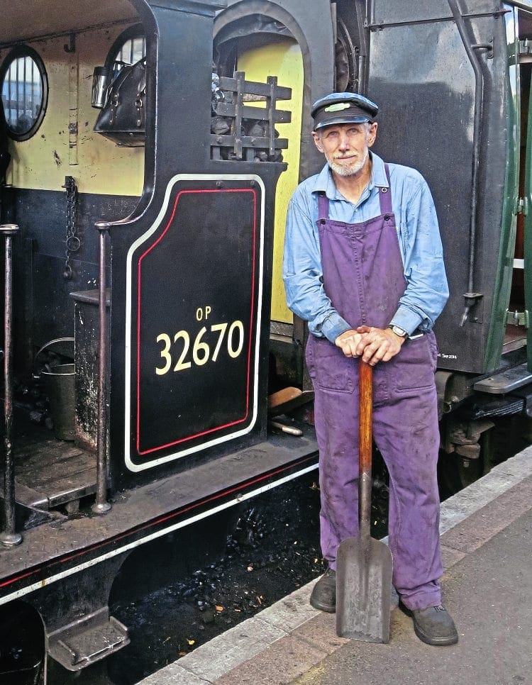 Fired up and ready to go: Long-distant volunteer John Bryant with A1X ‘Terrier’ 0-6-0T No. 32670 during a visit to the Kent & East Sussex Railway on September 11. IAN SCARLETT