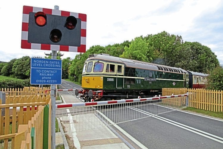 Class 33 D6515 Lt Jenny Lewis RM crosses the Norden Gates level crossing on October 6. ANDREW P M WRIGHT.