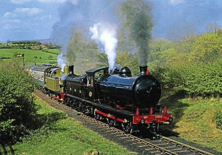 Sporting four red lamps, NELPG’s immaculate P3 No. 2392 pilots Lambton Tank No. 29 on the NYMR-reopening Royal train conveying the Duchess of Kent from Grosmont to Pickering at Esk Valley on May 1, 1973. MAURICE BURNS 