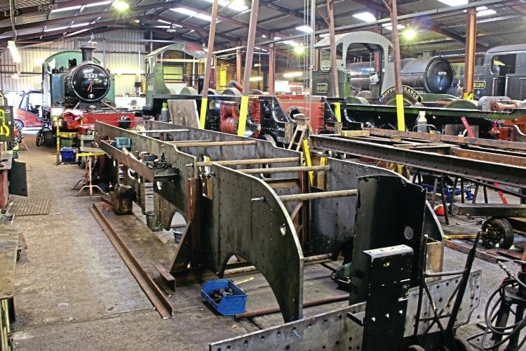 The frames of new-build LNER Sandringham 4-6-0 No. 61660 Spirit of Sandringham. In the background are GWR 2-6-2T Nos. 5532 and 5199, new-builds Betton Grange and The Unknown Warrior, and LNER D49 4-4-0 No. 62712 Morayshire. QUENTIN MCGUINESS 