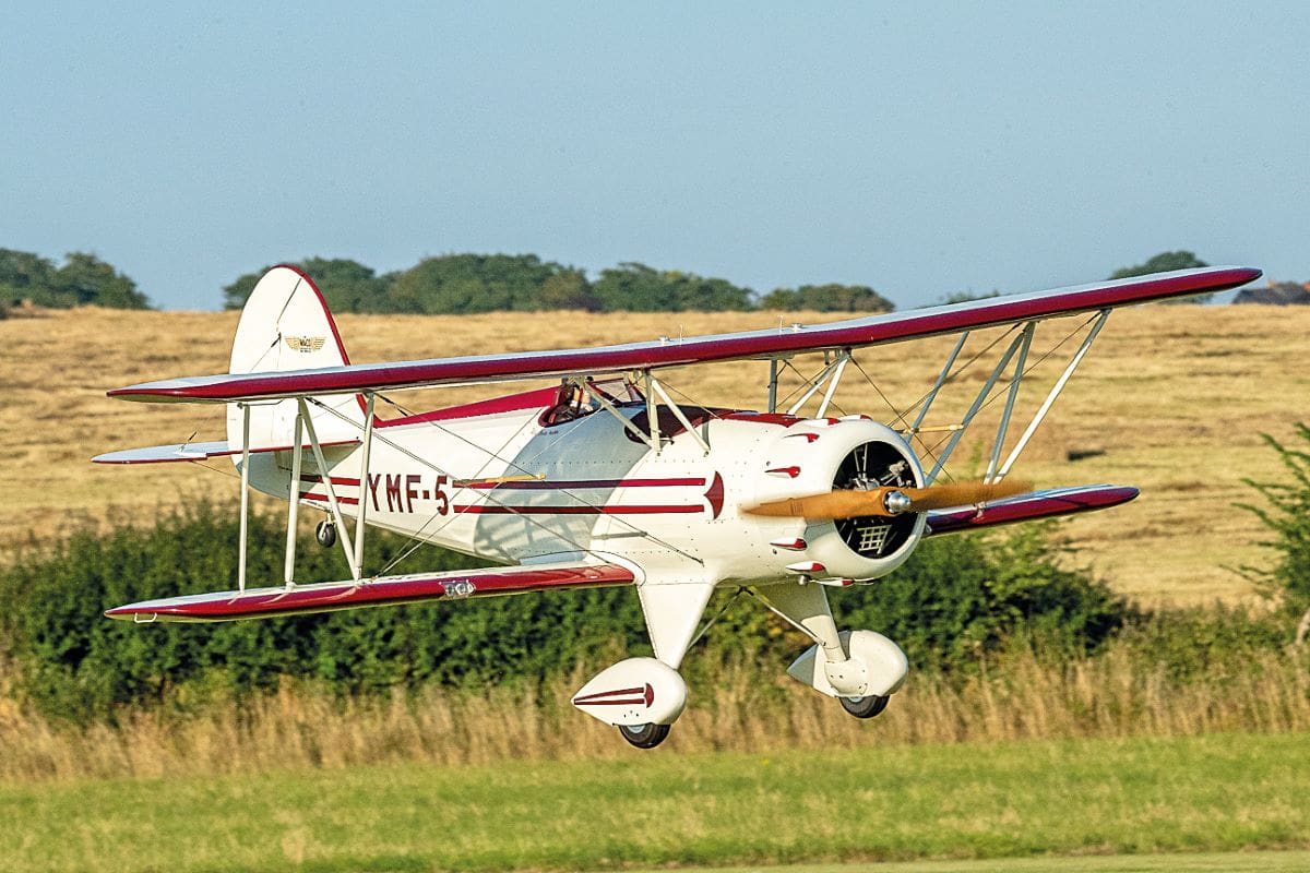 With the Moki on tick over the Waco lines up for landing. A fine sight!