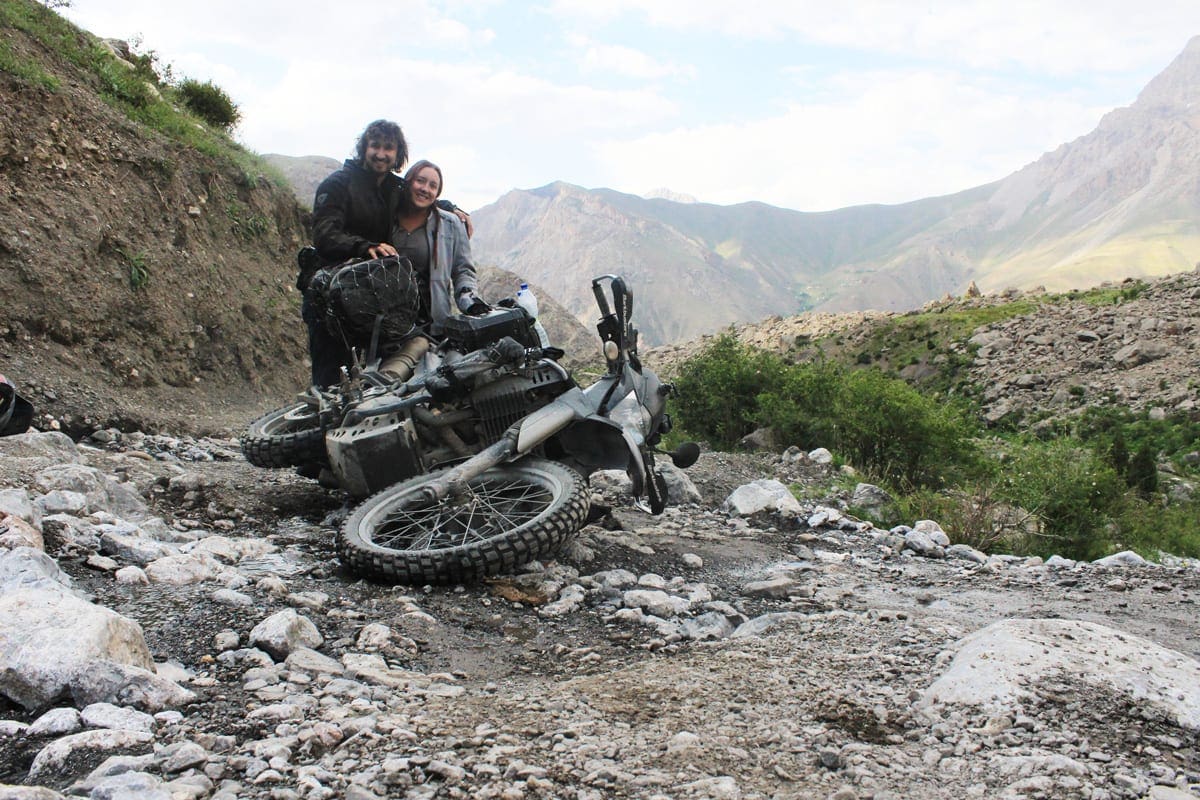 Andy and Alissa pose with their motorcycle