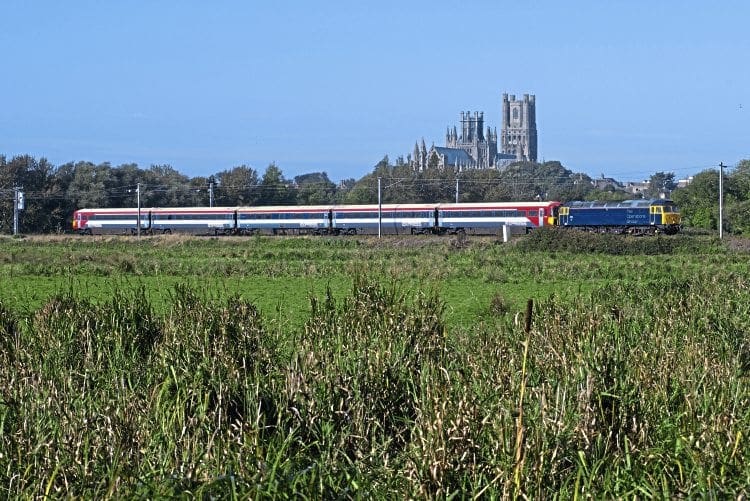 ROG’s No. 47812 nears its destination hauling ‘Wessex Electric’ No. 442418 as the 5E42/04.15 Eastleigh Works to Ely Papworth for storage on September 28. Peter R Foster