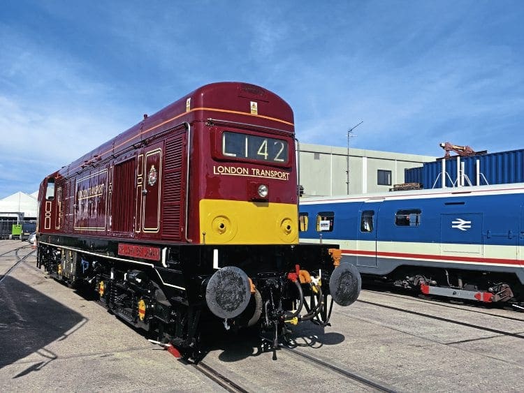 iPHONE SE: Michael Owen’s newly-liveried Type 1 No. 20142 on display at the London Transport Museum’s open weekend at Acton depot on September 24, after appearing at the Epping Ongar Railway’s diesel gala the weekend before. The open weekend was used to officially dedicate the loco being named Sir John Betjeman. Note the London Transport lettering on the nose end. Andy Hebden