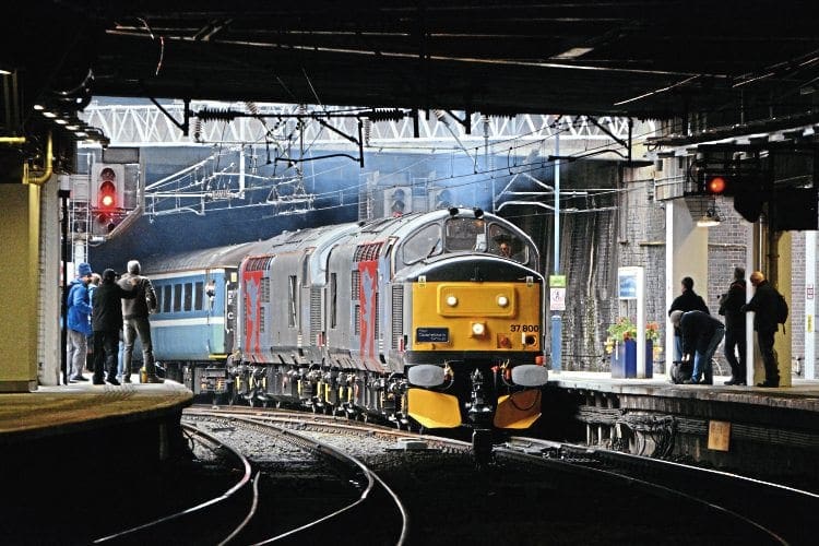 ‘Growling’ into Birmingham New Street on October 23, Europhoenix Type 3s Nos. 37800+37884 head the outward leg of the Rail Operations Group’s ‘Thrash Bash’ tour from Derby to Worcester Shrub Hill via South Wales. Stewart Higham 