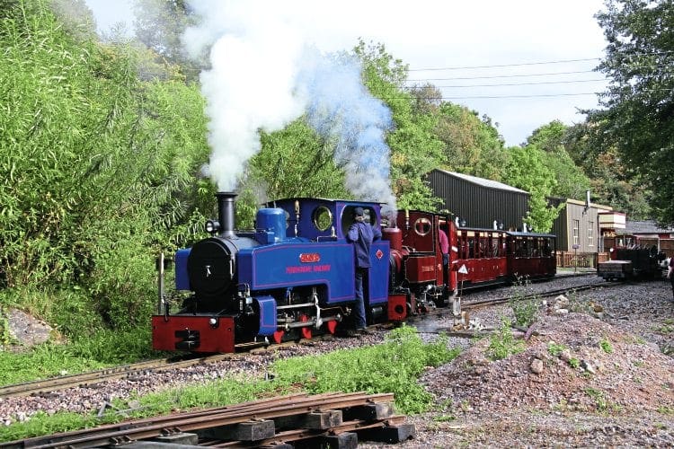 Alan Keef Ltd 2-6-2T Lydia pilots Exmoor 0-6-0T Spirit of Adventure away from Perrygrove station.