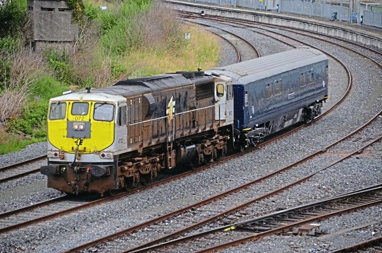 GM ‘071’ No. 072 hauls Belmond Mk3 sleeper No. 7158 Leitrim past Islandbridge Junction, near Dublin Heuston, during the run from North Wall to Inchicore on July 4. CHRIS PLAYFAIR