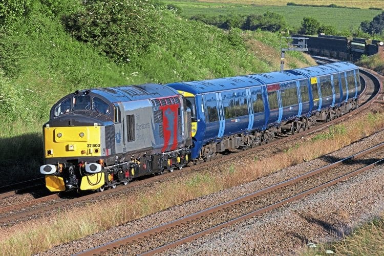 On July 2, ex-works Class 37 No. 37800 is seen just to the south of Wellingborough with the 5Q58 04.40 Derby Litchurch Lane-Ramsgate unit move, hauling Southeastern ‘Electrostar’ No. 375706. RICHARD GENNIS