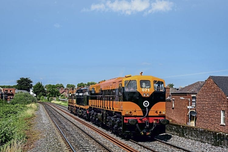 In May of this year, Class 071 pioneer No. 071 was repainted into a variation of its original ‘Supertrain’ livery at Inchicore to mark the 40th anniversary of the class. On July 19, the locomotive hauls GM Bo-Bos Nos. B141 and 175 during a transfer move from Inchicore to the RPSI’s shed at Dublin Connolly. FIONNBARR KENNEDY