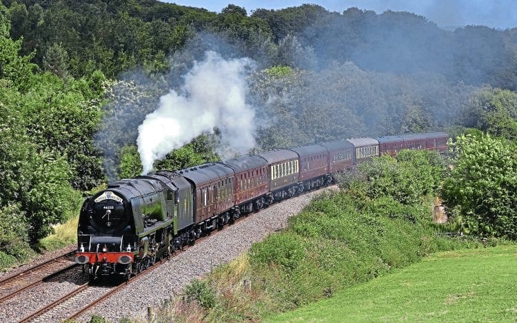 No. 46233 Duchess of Sutherland crests Dainton bank, with steam to spare on August 7, with the westbound ‘Royal Duchy’. STEPHEN GINN 