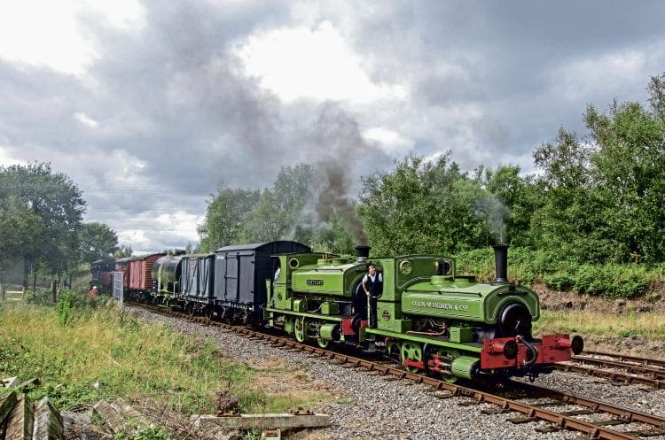 With a combined age of 207 years, Andrew Barclay 0-4-0STs Colin McAndrew and Rosyth No. 1 enter Chasewater Heaths station with a mixed freight from Brownhills West on September 4. ALISTAIR GRIEVE
