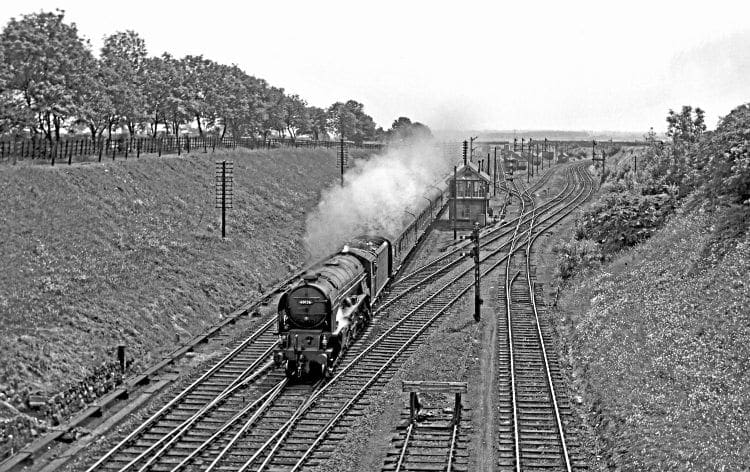 LNER ‘A1’ 60126 Sir Vincent Raven heads a Down passenger service through Tuxford Junction in August 1962. The west curve to the LD & ECR is to the right of the exchange sidings. J S HANCOCK