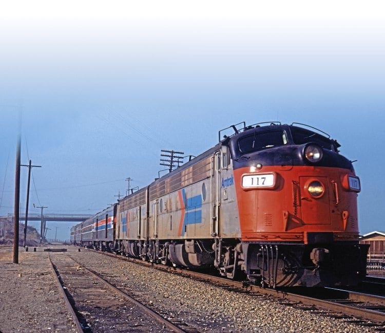 Amtrak EMD Type FP7A Nos. 117 and 112 (both inherited from Southern Pacific) wend their way across the south west states towards California in the spring of 1975. TRACKS NORTH ARCHIVE 