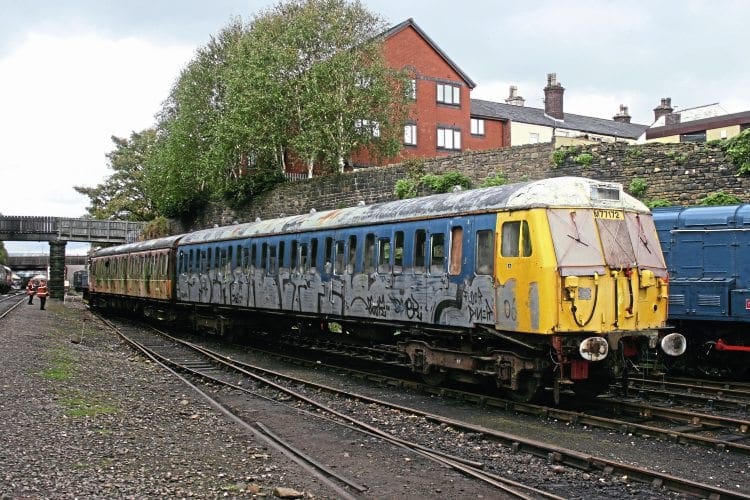 Class 504 trailer car No. M77172 being drawn away from the carriage and wagon sidings at Bury on October 16 while being repositioned at Buckley Wells, to where it can be worked on by the preservation society. SIMON THOMAS 