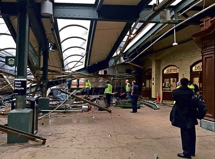 The wreckage of the NJT train after part of Hoboken station roof was brought down. TWITTER