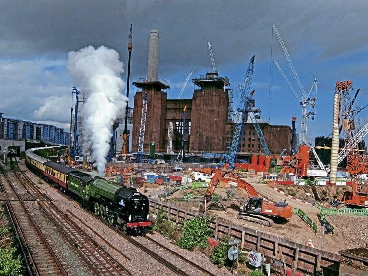 New build meets re-build: No. 60163 Tornado drifts past the Battersea Power Station development on September 30, while in charge of the British Pullman. JAMES HAMILTON 