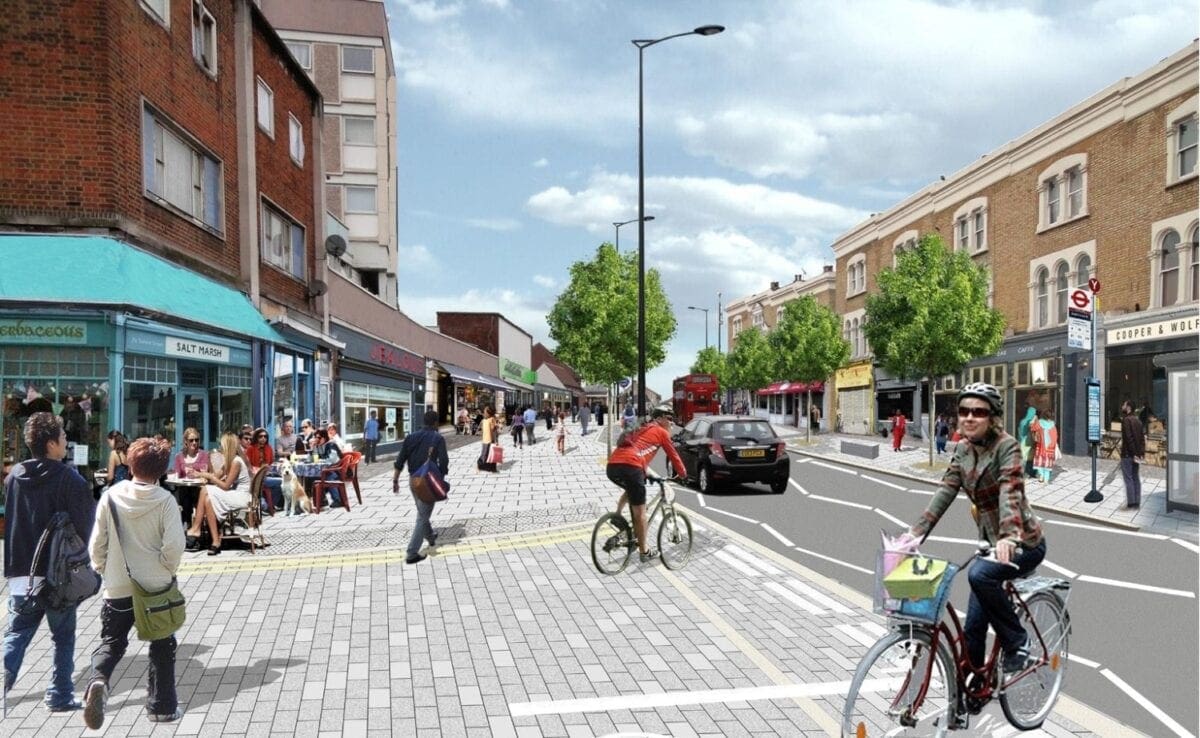 Smiley cyclists, happy pedestrians and wide pavements – artist's impression of a traffic-calmed high street (Transport for London)