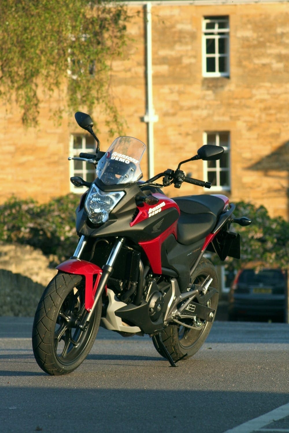 Is it a motorcycle with scooter genes, or the other way round?