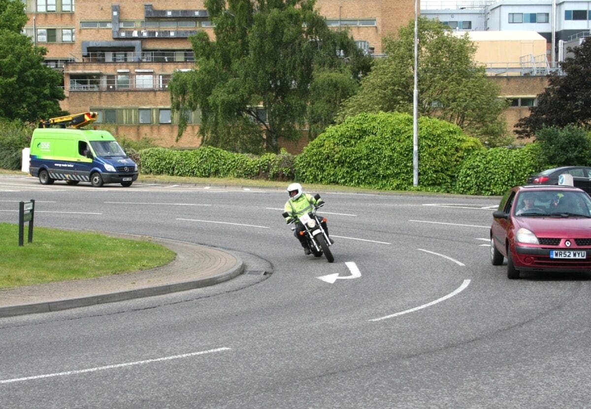 Indicating right, and the right-hand lane, so no doubts about where he's going